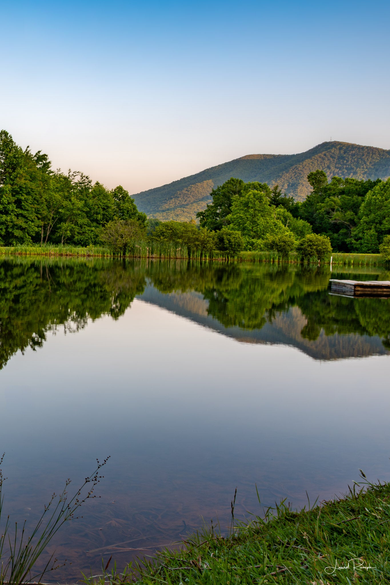 View of Mount Jefferson at Sunset with the pond at Ashe County park in the foreground, Jefferson, North Carolina. 2x3 crop