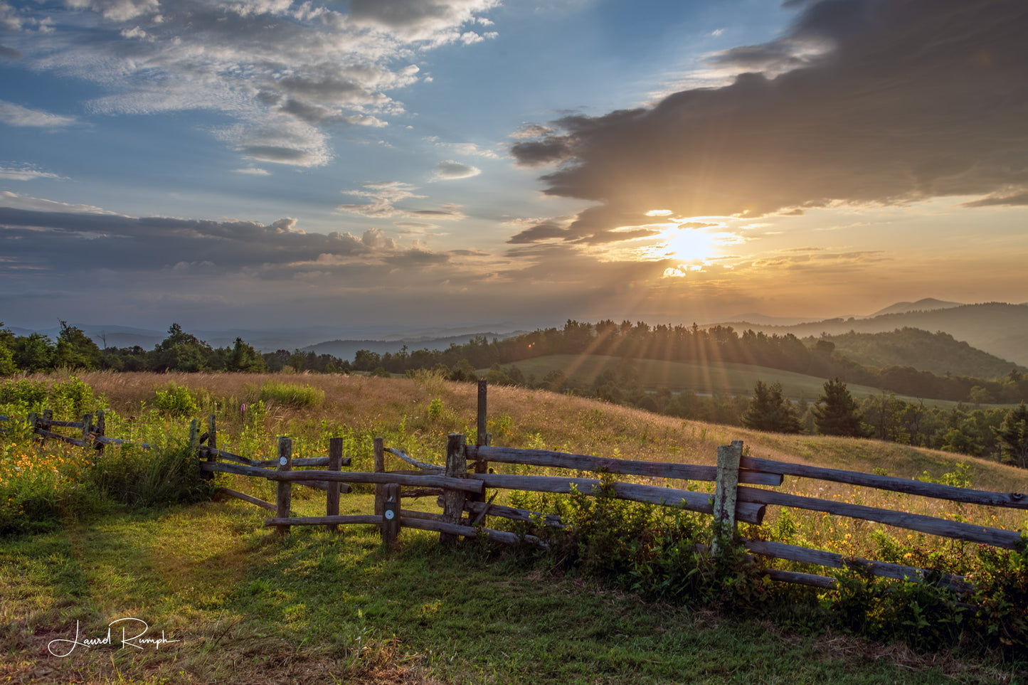 Sunrise at Doughton Park on the Blue Ridge Parkway, North Carolina, overlooking the Mountains to sea trail with a dramatic sky. 2x3 crop