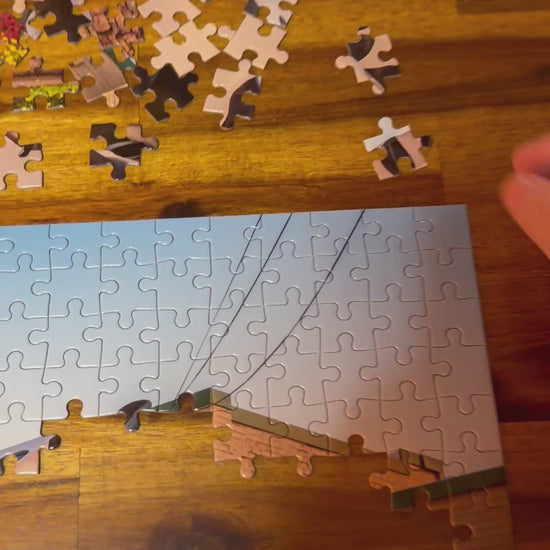 Video demonstrating jigsaw puzzle pieces and how well they fit, for puzzles of Ashe county north carolina and the blue ridge parkway.
