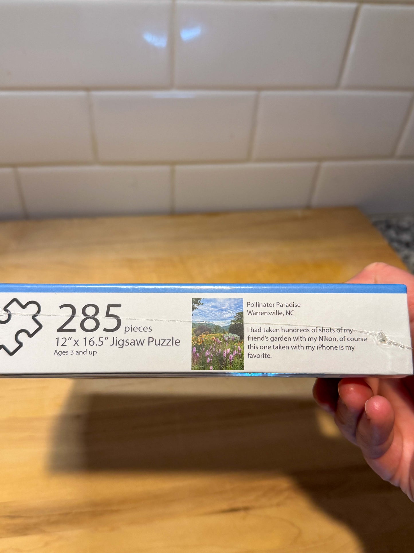 Jigsaw puzzle box of a pollinator garden puzzle in Ashe County, North Carolina