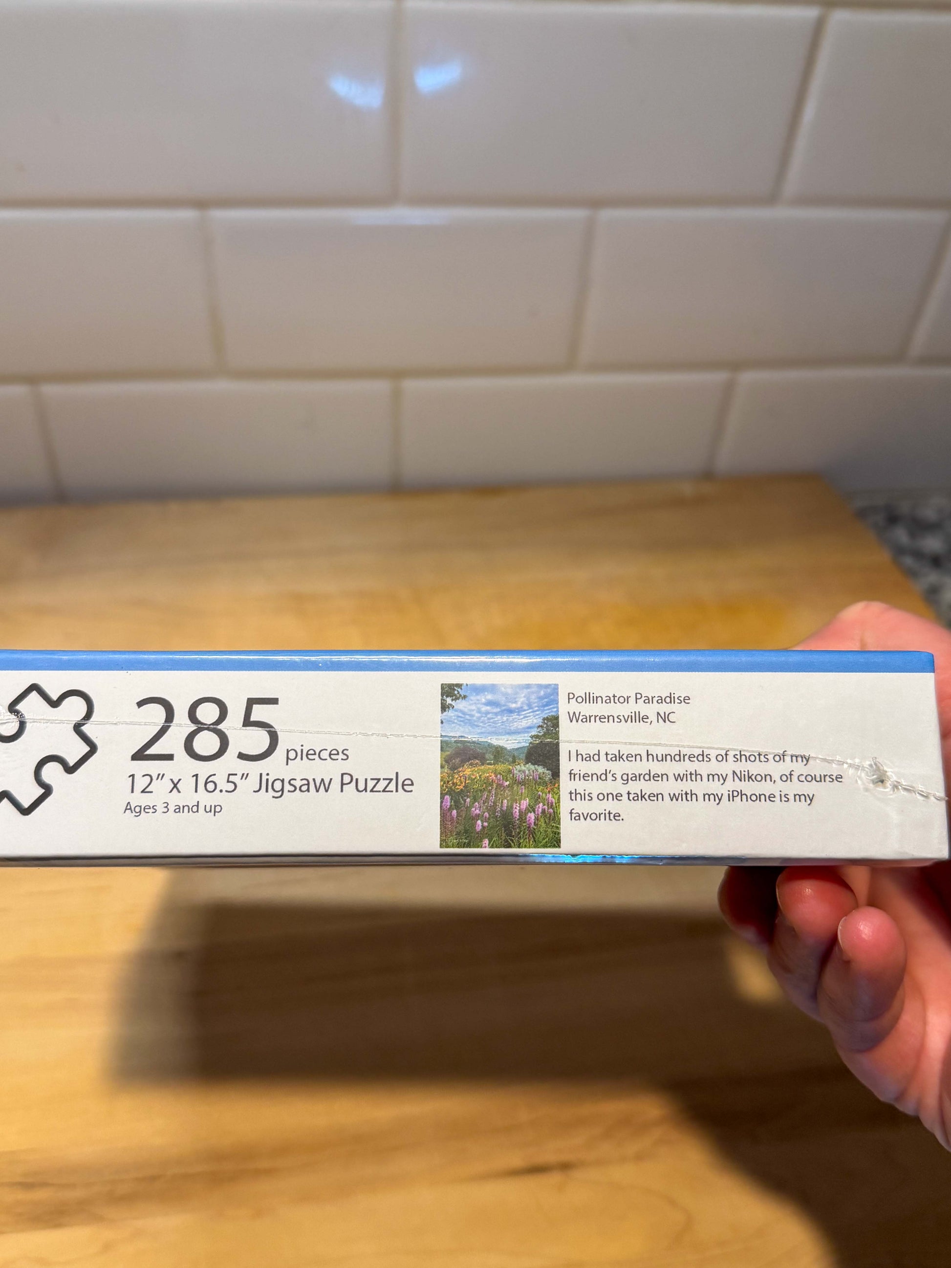 Jigsaw puzzle box of a pollinator garden puzzle in Ashe County, North Carolina