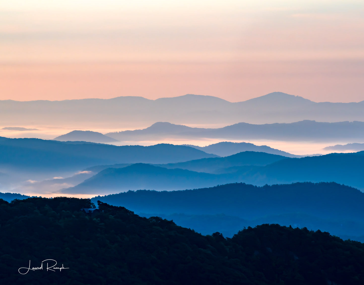 View from Thunder hill overlook near Blowing Rock, North Carolina, of iconic blue ridge mountains, because of daylight hour, mountains are blue and white. 4x5 crop